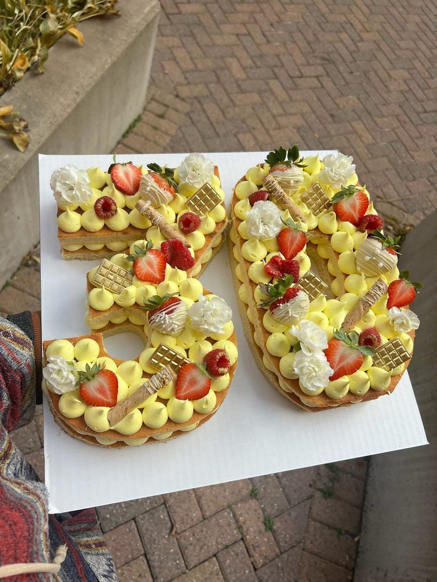Number 50 cake with fruit and flowers