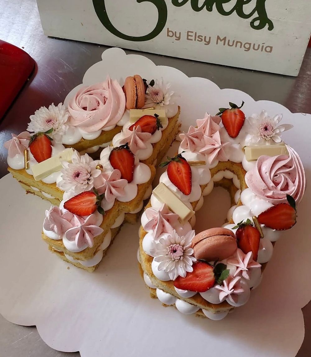 Strawberry number cake with macarons and flowers