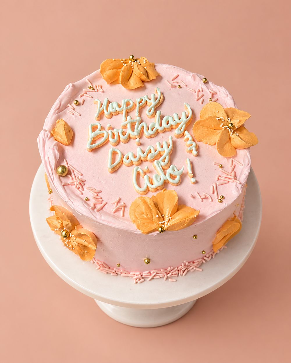 Pink cake with peach flowers